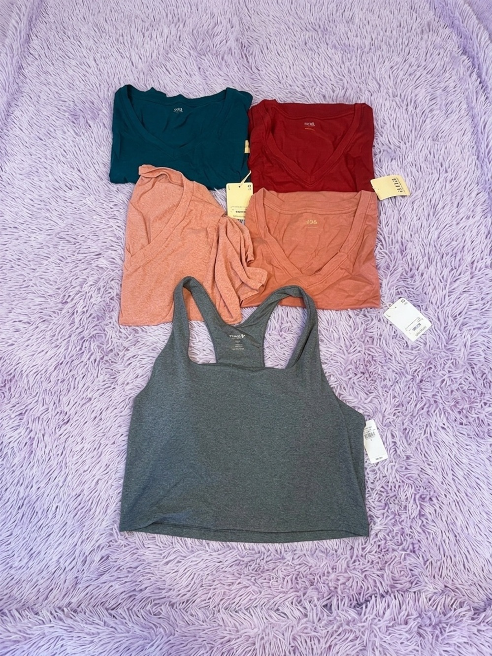 Size large tops. All brand new with tags minus one.